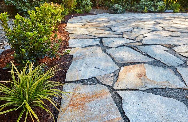 Flagstone Installation For Walkways, Patios, And Garden Paths